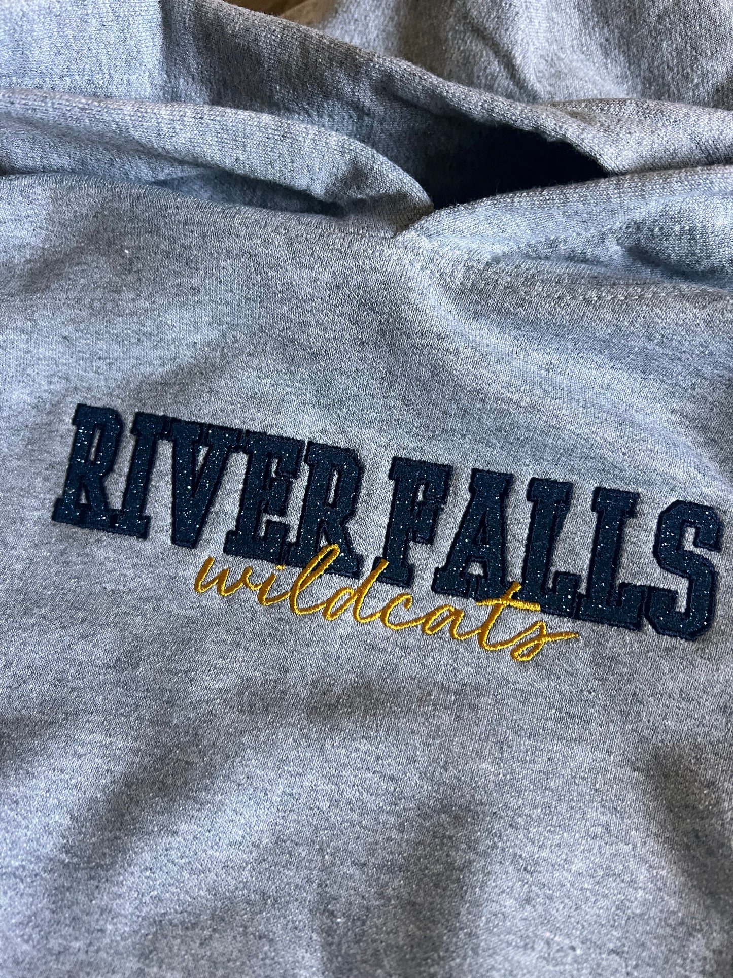 River Falls Retail Online Youth Glitter Hoodie